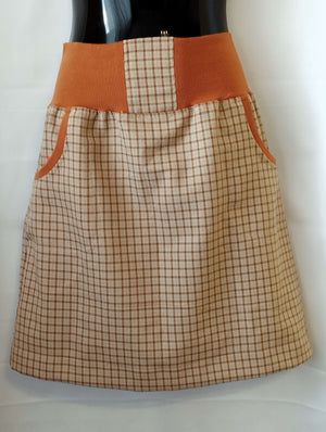 Dámská sukně béžová oranžová kostka polyester náplet kapsy – elegantní sukně s pružným pasem, kapsami a výrazným vzorem. Ručně šitá od Ivastyl