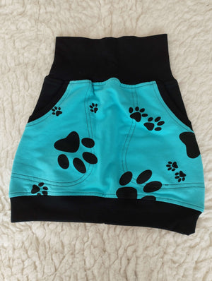 Dívčí sukně z bavlněné teplákoviny s kapsami a pružným pasem. Délka 35 cm. Pohodlný střih, materiál s příměsí lycry